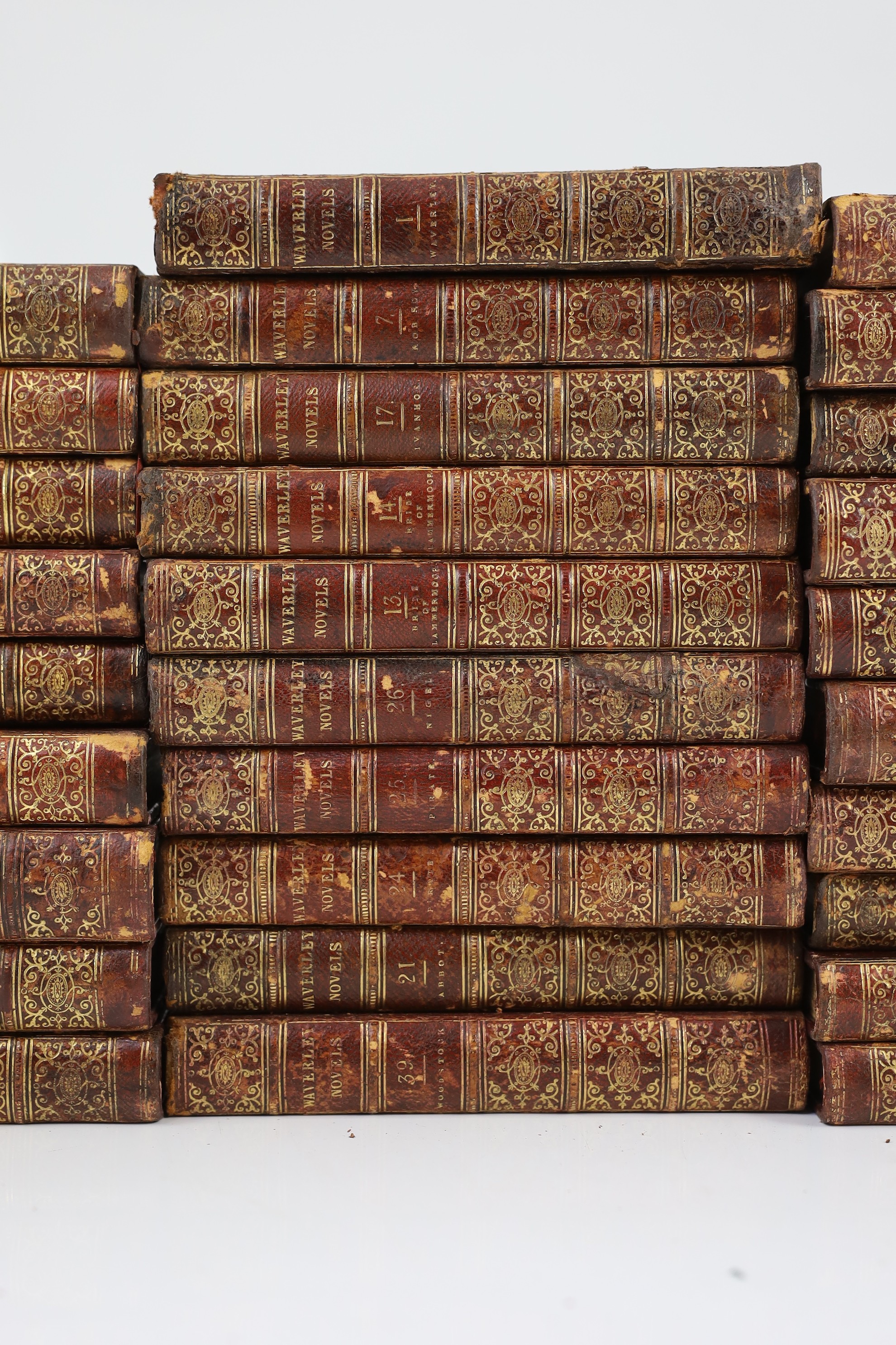 Scott, Sir Walker - Waverley Novels, 48 vols., engraved pictorial and printed titles, frontispieces; contemp. gilt-decorated maroon half morocco and marbled boards with panelled spines, marbled edges and e/ps., sm.8vo. E